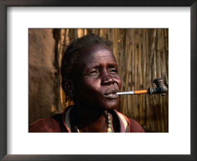 Woman Smoking A Pipe, Gambela, Ethiopia by Ariadne Van Zandbergen Pricing Limited Edition Print image