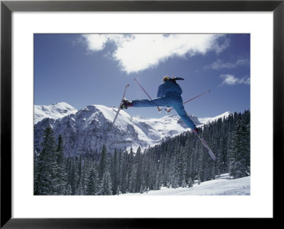 A Skier Takes A Flying Leap by Paul Chesley Pricing Limited Edition Print image