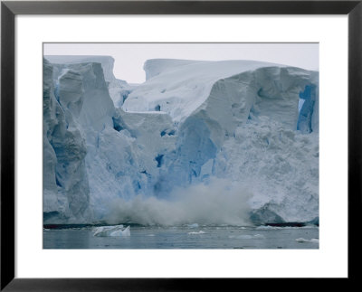 Calving Ice Falls From An Ice Formation Into Water by Maria Stenzel Pricing Limited Edition Print image
