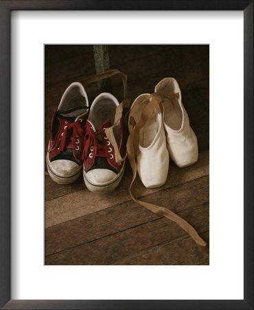 A Pair Of Ballet Toe Shoes Rest Next To A Pair Of Tennis Shoes by Jodi Cobb Pricing Limited Edition Print image