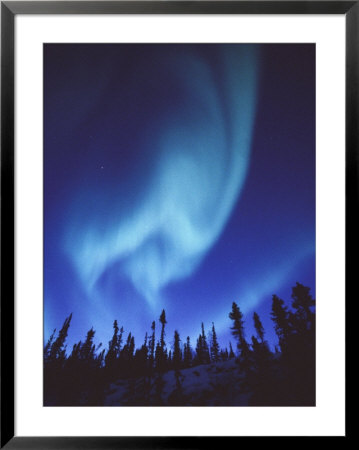 The Aurora Borealis Creates Fantastic Patterns Across The Northern Sky by Paul Nicklen Pricing Limited Edition Print image