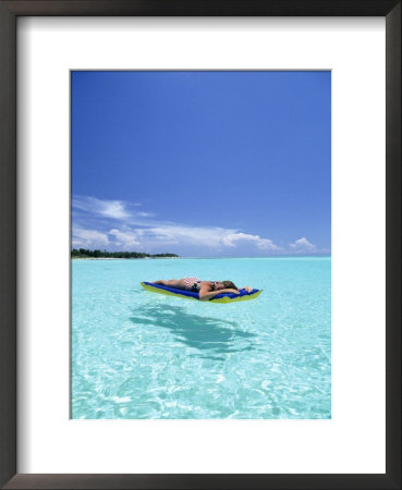 Woman In Bikini On Raft, Cozumel, Mexico by David Mechlin Pricing Limited Edition Print image