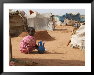 A Girl Washes Plates For Her Family In The North Darfur Refugee Camp Of El Sallam October 4, 2006 by Alfred De Montesquiou Pricing Limited Edition Print image