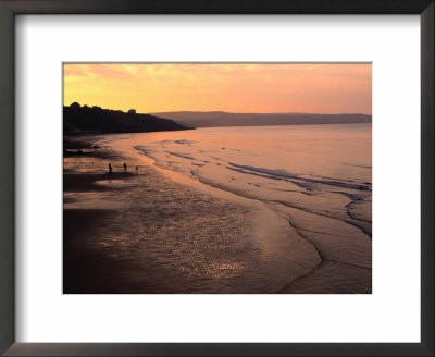 Sunset Over Beach At Low-Tide Whitby, England by Glenn Beanland Pricing Limited Edition Print image