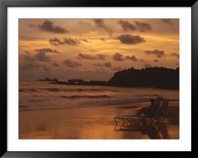 Sunset Over A Puerto Vallarta Beach by Raul Touzon Pricing Limited Edition Print image