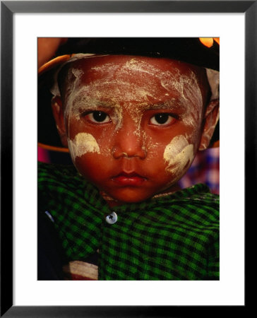 Boy With Paste Of Thanakha Tree Bark On Face, Looking At Camera, Myanmar (Burma) by Frank Carter Pricing Limited Edition Print image