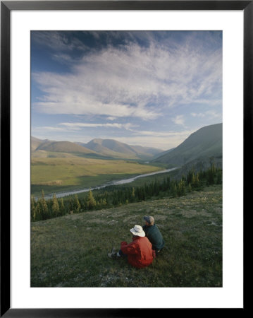 Hikers Overlook The Firth River And Surrounding Mountains by Michael Melford Pricing Limited Edition Print image