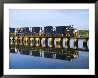 An Early Freight Train Crosses The Trestle Over The Matanzas River by Stephen St. John Pricing Limited Edition Print image