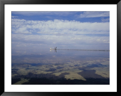 A Cargo Tanker Ship At Port Along A Jetty At Point Henry In Victoria by Jason Edwards Pricing Limited Edition Print image