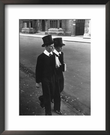 At Eton College, Students Walking Down High Street In Their Uniforms by John Phillips Pricing Limited Edition Print image