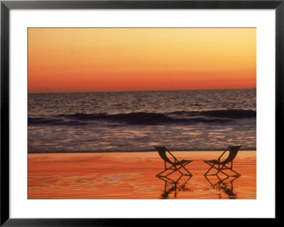 Silhouette Of Two Chairs On The Beach by Mitch Diamond Pricing Limited Edition Print image