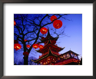 Chinese Pagoda And Tree Lanterns In Tivoli Park, Copenhagen, Denmark by Izzet Keribar Pricing Limited Edition Print image