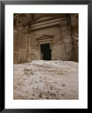 Handprints Adorn A Rock Outside Of A Petra Cliffside Dwelling by Jodi Cobb Pricing Limited Edition Print image