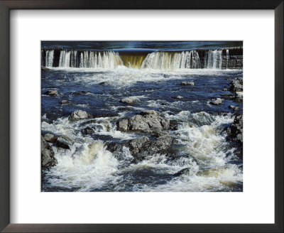 A View Of Rapids With A Man-Made Waterfall In The Background by Todd Gipstein Pricing Limited Edition Print image