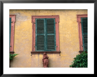 Statue Under Shutters In Seleginstadt, Hesse, Germany by Johnson Dennis Pricing Limited Edition Print image