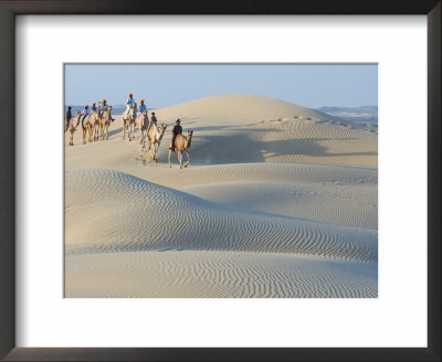 Men Traveling On Camelback Across Sand Dunes, Jaisalmer, Rajasthan, India by Philip Kramer Pricing Limited Edition Print image