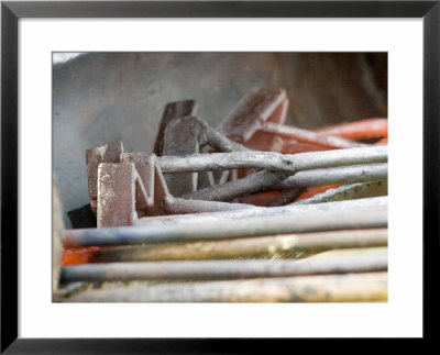 Branding Irons At Hughes Ranch Near Stanford, Montana, Usa by Chuck Haney Pricing Limited Edition Print image