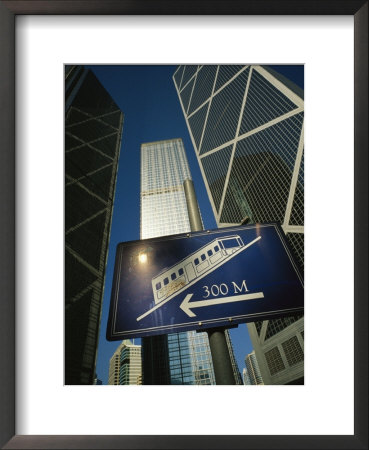 Sign For The Peak Tram With Bank Of China Tower And Other Buildings by Eightfish Pricing Limited Edition Print image