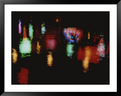 Colorful Neon Of Popular Nightspots Reflect In The Riverwalk Surface by Stephen St. John Pricing Limited Edition Print image
