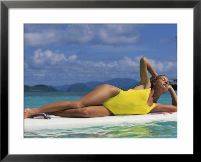 Woman Sunbathing On Float In Sea by Mark Segal Pricing Limited Edition Print image