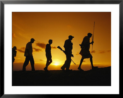 Silhouette Of Laikipia Masai Guides And Tourists On A Bush Safari by Richard Nowitz Pricing Limited Edition Print image