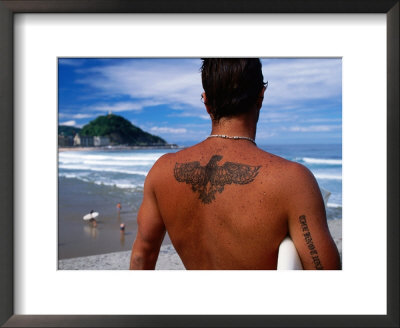 Tattooed Surfer Looking At Beach, San Sebastian, Spain by Dallas Stribley Pricing Limited Edition Print image