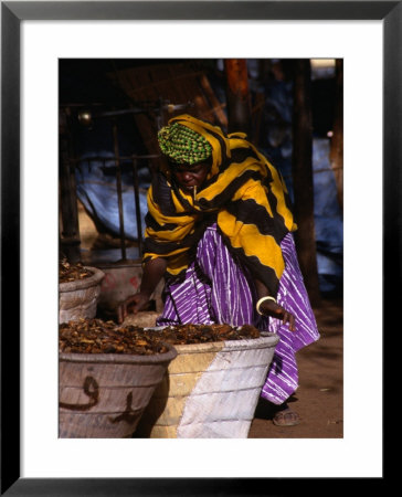 Local Woman Setting Up To Sell Dried Fish In Mopti Harbour, Mopti, Mali by Patrick Syder Pricing Limited Edition Print image
