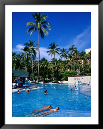 People In Pool, Melia Resort, Puerto Vallarta, Mexico by Richard Cummins Pricing Limited Edition Print image