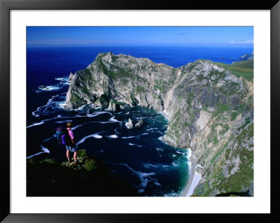 Hiker Looking Across To Sturall, Ireland by Gareth Mccormack Pricing Limited Edition Print image