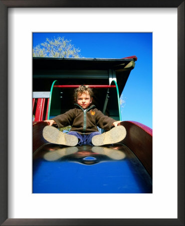 Boy On Slide, Copenhagen, Denmark by Martin Lladó Pricing Limited Edition Print image