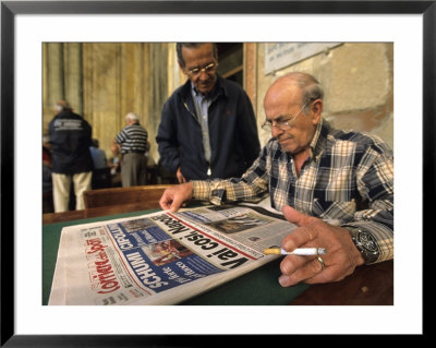 Man With Sports Newspaper, Sorrento, Italy by Holger Leue Pricing Limited Edition Print image