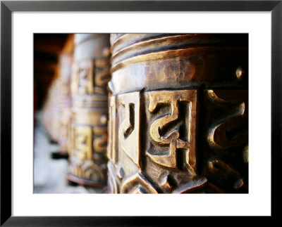 Detail Of Prayer Wheels With Tibetan Pali Script, Kagbeni, Nepal by Anthony Plummer Pricing Limited Edition Print image