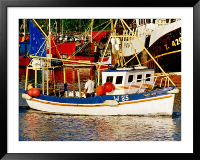 Fishing Boat In Port, Dunmore East, Ireland by Richard Cummins Pricing Limited Edition Print image