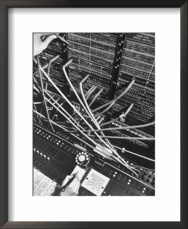 Telephone Operator's Hand Writing On Notepad In New York Telephone Co. Office by Margaret Bourke-White Pricing Limited Edition Print image