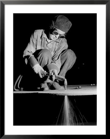 Female Welder At Work In A Steel Mill, Replacing Men Called To Duty During World War Ii by Margaret Bourke-White Pricing Limited Edition Print image
