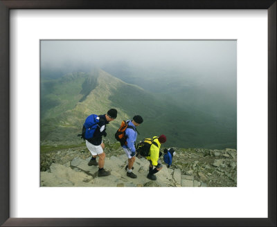 Hikers Descend Stone Stairs High Atop Mount Snowdon by Joel Sartore Pricing Limited Edition Print image