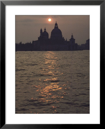 The Low Sun Silhouettes Santa Maria Della Salute Church by Steve Winter Pricing Limited Edition Print image