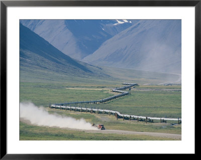 Haul Truck Driving Near The Trans-Alaska Pipeline, Brooks Range by Rich Reid Pricing Limited Edition Print image
