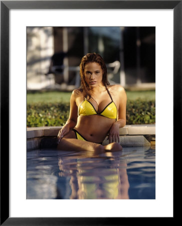 Woman In Yellow Bikini Sitting In Pool by Stewart Cohen Pricing Limited Edition Print image