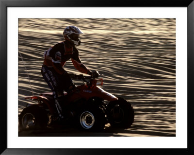 Man On Motorcycle Riding On Dunes by David Burch Pricing Limited Edition Print image