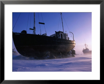 Fishing Boats Beached On Shore Of Frobisher Bay For Winter, Iqaluit, Baffin Island, Nunavut, Canada by Grant Dixon Pricing Limited Edition Print image