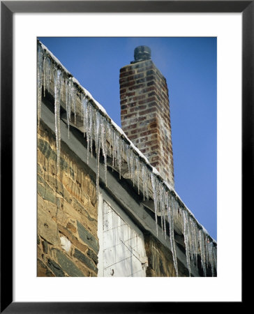 Rows Of Sharp Icicles Line The Roof Of An Old Mill Building, Pierce Mill In Rock Creek Park by Stephen St. John Pricing Limited Edition Print image