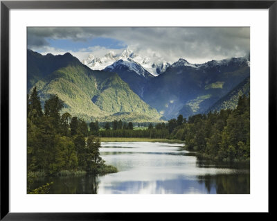 Cloud-Shrouded Mt. Cook Reflected In Lake Matheson, Near Town Of Fox Glacier, South Island by Dennis Flaherty Pricing Limited Edition Print image
