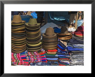 Hats And Clothes For Sale At Market, Pisac, Peru by Dennis Kirkland Pricing Limited Edition Print image