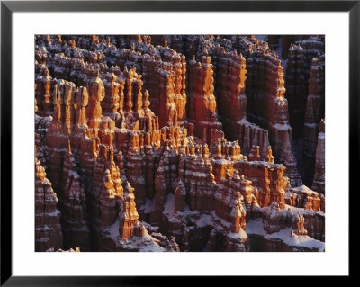 Rock Formations At Bryce Canyon With A Light Dusting Of Snow by Norbert Rosing Pricing Limited Edition Print image
