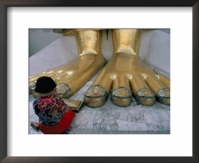 Woman Praying At The Feet Of The Buddha In The Temple Of The Standing Buddha by Bruno Barbier Pricing Limited Edition Print image