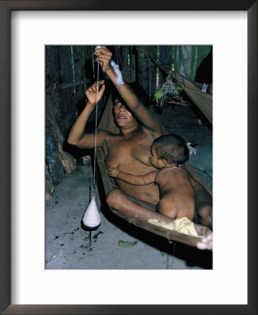 Amazonian Indian Woman Spinning, Brazil, South America by Robin Hanbury-Tenison Pricing Limited Edition Print image