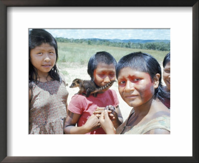 Gorotire Indian Girls With Coati, Brazil, South America by Robin Hanbury-Tenison Pricing Limited Edition Print image