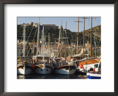 Harbour Area And Venetian Fortress Dating From 1551 On The Hill, Hvar Island, Dalmatia, Croatia by Christian Kober Pricing Limited Edition Print image