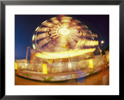 A Slow Exposure Captures Lights On A Spinning Carnival Ride by Heather Perry Pricing Limited Edition Print image